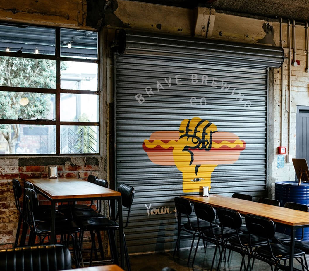Brave Brewing Co taproom roller door with logo