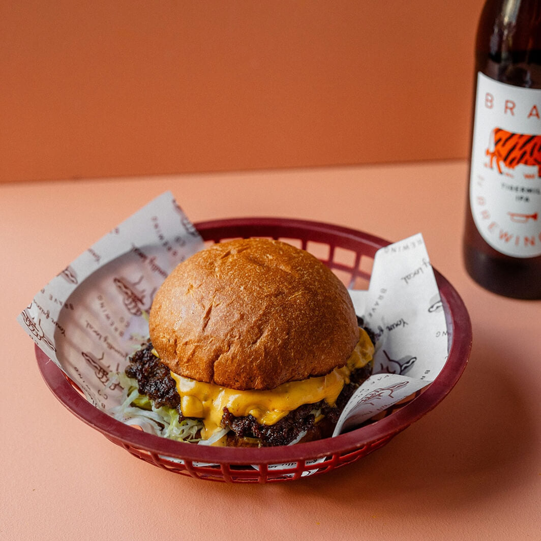 Brave brewing Co cheeseburger with organic beef